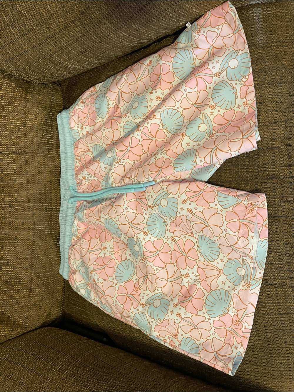 Caden Lane Men’s Swim Trunks in Pastel Pink and Light Blue Seashell Print